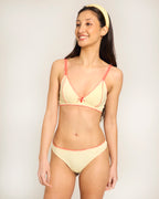 Woman wearing a Yellow Everyday Thong & Bra by Buttah
